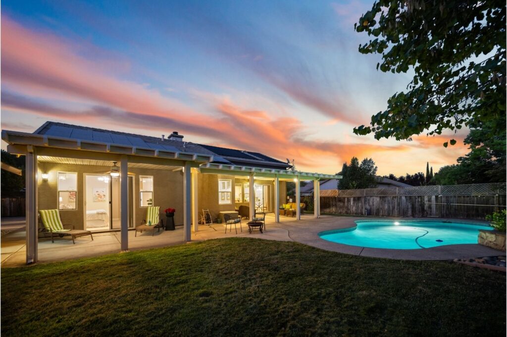 house with pool at twilight