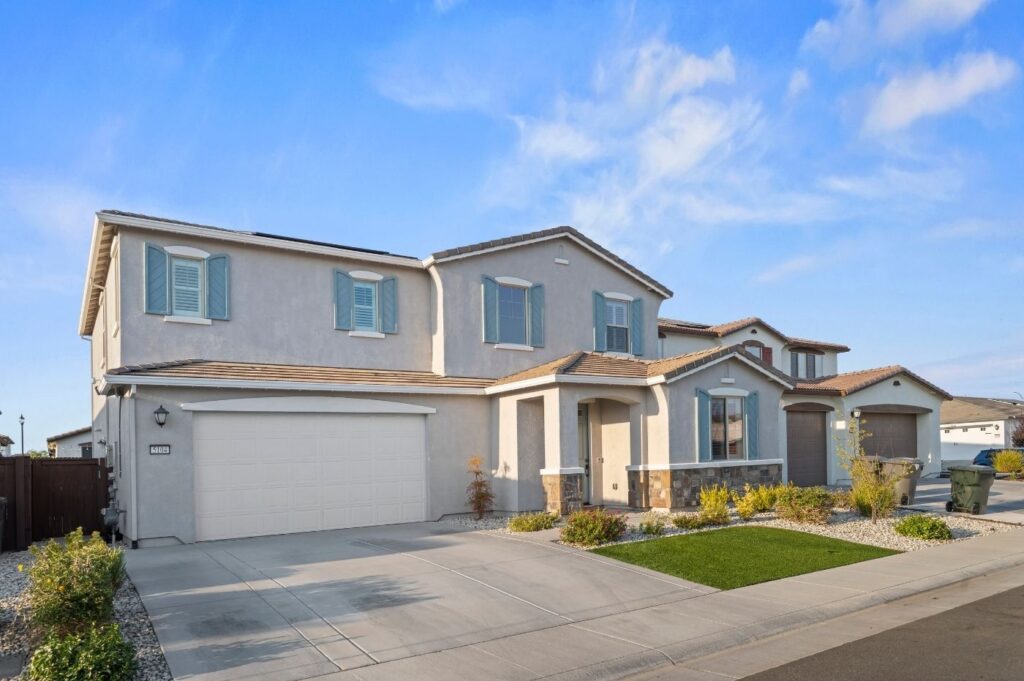 photo of house with blue sky
