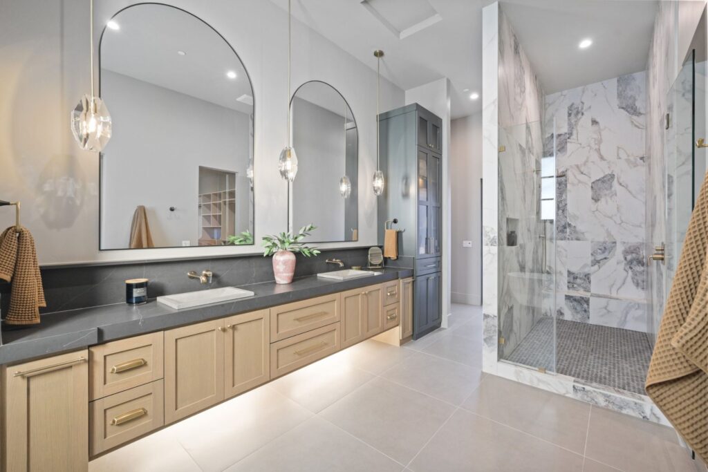 bathroom with big arch shaped mirrors